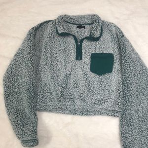 Sherpa half zip cropped sweater. Very warm and on trend :)
